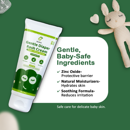 Tube of Gentle Diaper Rash Cream with green and white design on a green background with a plush toy.