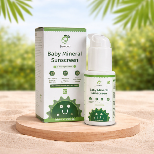 Barebub Baby Mineral Sunscreen packaging and bottle on a wooden platform with a natural background
