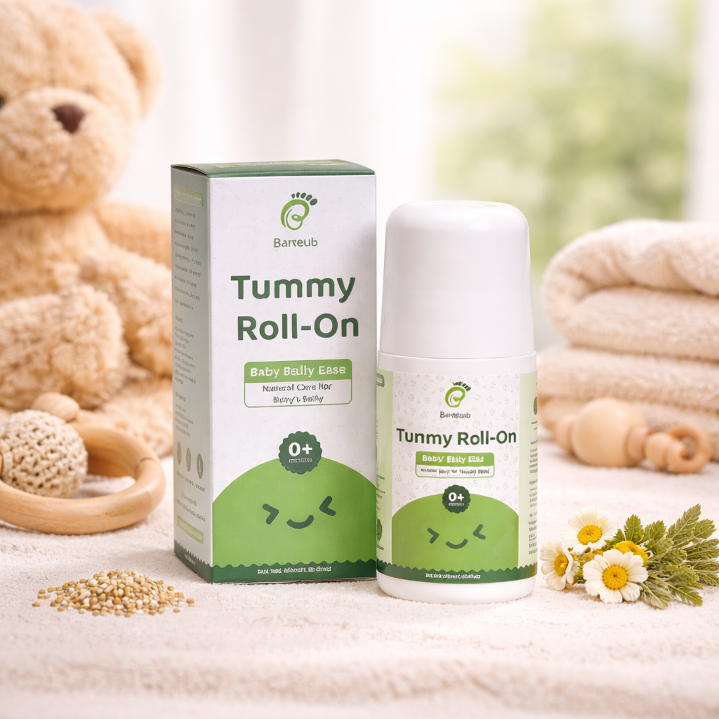Tummy Roll-On product with packaging on a soft surface with a teddy bear and flowers in the background