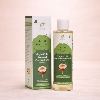 Barefeet Virgin Cold Pressed Coconut Oil bottle and packaging on a light pink background